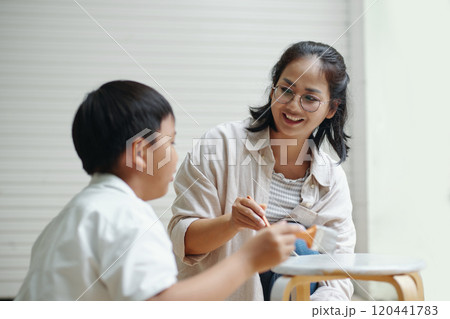 Mother Teaching Son Art Craft at Home Mother Teaching Son Art Craft at Home 120441783