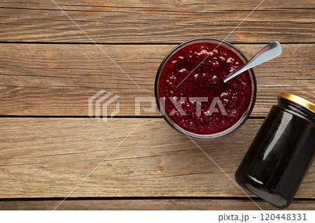 Plum jam on grey wooden background with copy space Plum jam on grey wooden background with copy space 120448331