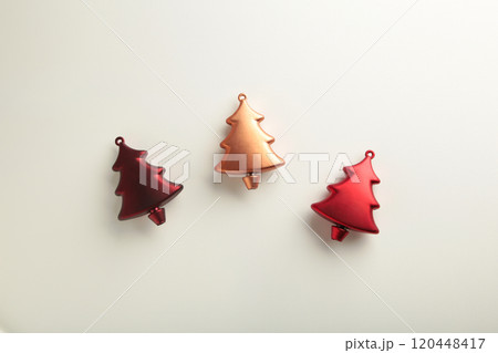 Gold and red christmas plastic fir tree on white background. Minimalism. Flat lay 120448417