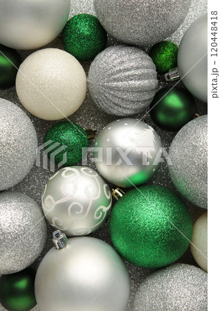 Green and silver christmas bauble balls background Green and silver christmas bauble balls background 120448418