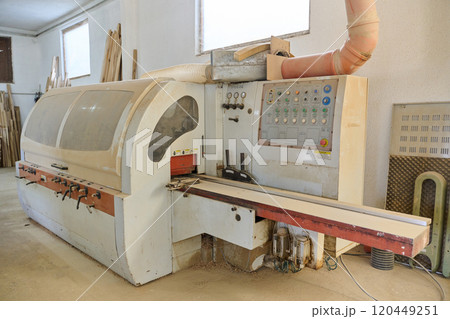 Interior of Wood Processing Industry Featuring CNC Cutting Machines and Wood Processing Equipment Interior of Wood Processing Industry Featuring CNC Cutting Machines and Wood Processing Equipment 120449251