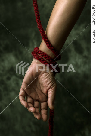 red rope symbolizing the struggle against aids red rope symbolizing the struggle against aids 120450395