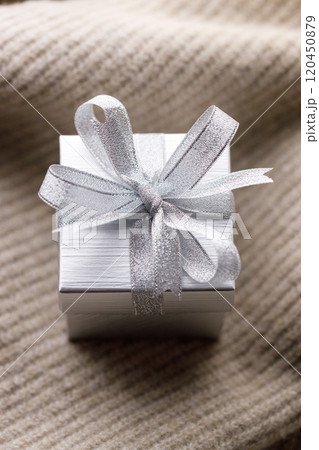 Artisan gift box on soft sweater Artisan gift box on soft sweater 120450879