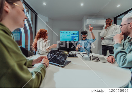 A diverse group of businessmen collaborates and tests a new virtual reality technology, wearing virtual glasses, showcasing innovation and creativity in their futuristic workspace 120450995