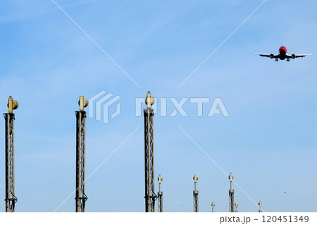 Plane and lights in airport 120451349