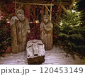Traditional Christmas nativity scene with figures made out of wood, the birth of Jesus Christ in the manger surrounded by Joseph and Mary. 120453149