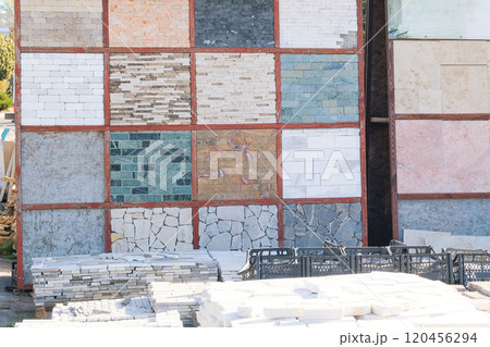 Variety of decorative tiles are sold in construction market. Construction Materials. Materials for decoration and construction houses. 120456294