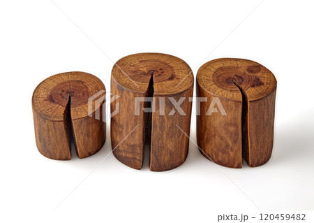three brown walnut wood cuts with cracks for product demonstration isolated on white background three brown walnut wood cuts with cracks for product demonstration isolated on white background 120459482