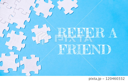 A puzzle with the words refer a friend written on it 120460332