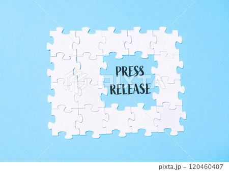 A puzzle with the word press release written in the middle 120460407
