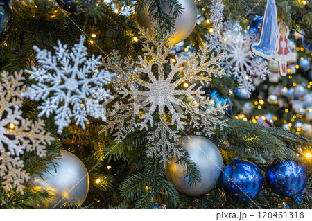 New Year's colorful trees in front of the Central Department Store in Moscow on Kuznetsky Most 120461318