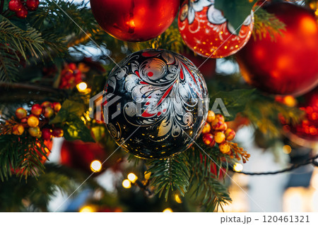 New Year's colorful trees in front of the Central Department Store in Moscow on Kuznetsky Most 120461321