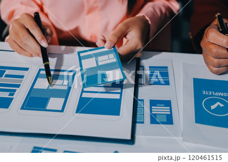 Young Asian business creative team work together, mobile application software design project. Brainstorm meeting, internet technology, smartphone web app designer, office coworker teamwork concept 120461515