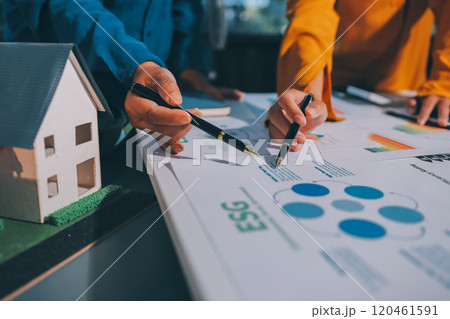 ESG environmental social governance display on laptop on eco-friendly company meeting with business people implementing environmental protection for clean and sustainable future ecology. Trailblazing 120461591