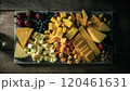 plate of different types of cheese on white background 120461631
