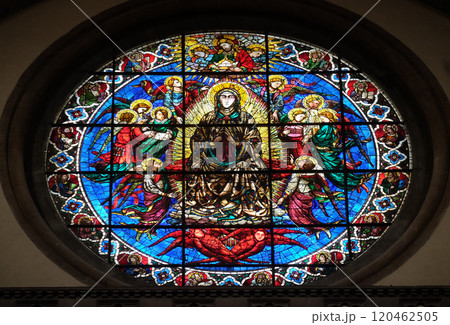 Virgin Mary surrounded by Angels by Lorenzo Ghiberti, 1405, stained glass window in the Cattedrale di Santa Maria del Fiore (Cathedral of Saint Mary of the Flower), Florence, Italy 120462505