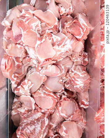 The pork collar sliced in the metal tray. 120463139