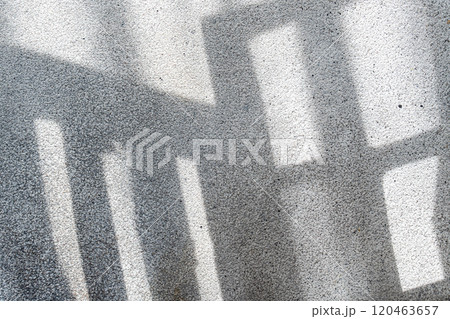 Shadows from the window on concrete wall 120463657