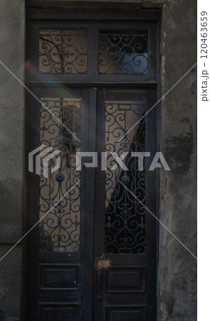 Old door with metal carving details Old door with metal carving details 120463659
