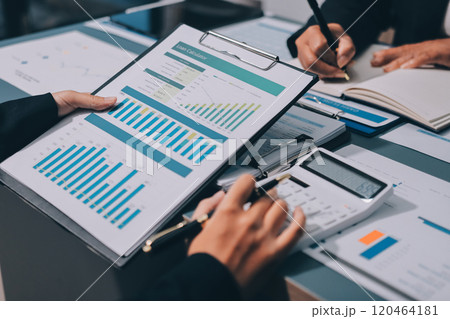 Fund managers team consultation and discuss about analysis Investment stock market at office 120464181