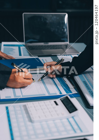 Fund managers team consultation and discuss about analysis Investment stock market at office 120464197