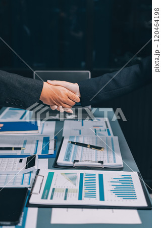Business handshake for teamwork of business merger and acquisition,successful negotiate,hand shake,two businessman shake hand with partner to celebration partnership and business deal concept 120464198
