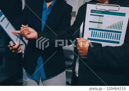 Business people are analyzing and planning business strategies. 120464210