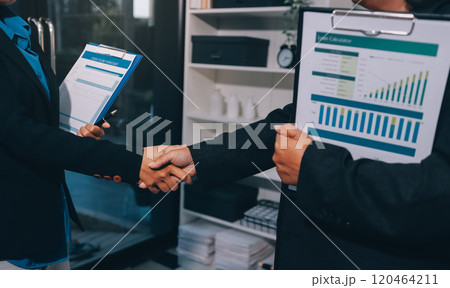 Female hands shaking at group meeting making partnership deal, businesswoman welcoming new partner with handshake as concept of collaboration gratitude respect, women power in business, close up view 120464211