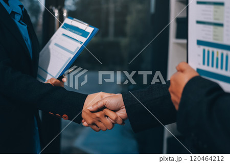 Female hands shaking at group meeting making partnership deal, businesswoman welcoming new partner with handshake as concept of collaboration gratitude respect, women power in business, close up view 120464212