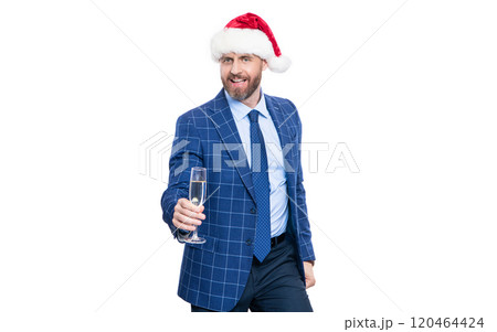 Merry Christmas. Business man in Santa Claus hat celebrating and cheering. Party fun. Businessman at holiday. Businessman drink champagne in corporate Christmas party. Celebrate New Year. Cheers Merry Christmas. Business man in Santa Claus hat celebrating and cheering. Party fun. Businessman at holiday. Businessman drink champagne in corporate Christmas party. Celebrate New Year. Cheers 120464424