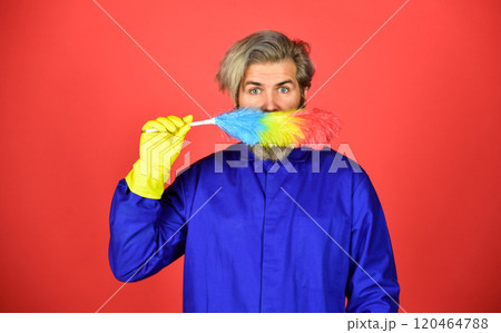 Cleaning the apartment. man use pp duster. hipster holding the cleaning tool. cleaning and home concept. Male Sweeping with small duster broom. cleaning service. housekeeping business Cleaning the apartment. man use pp duster. hipster holding the cleaning tool. cleaning and home concept. Male Sweeping with small duster broom. cleaning service. housekeeping business 120464788