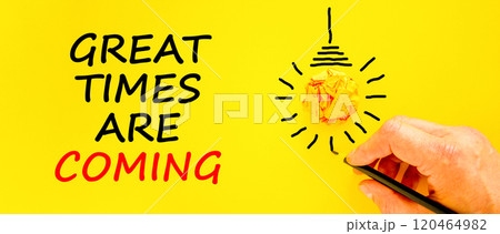 Great times are coming symbol. Concept words Great times are coming on beautiful yellow paper. Beautiful yellow background. Businessman hand. Business great times are coming concept. Copy space. Great times are coming symbol. Concept words Great times are coming on beautiful yellow paper. Beautiful yellow background. Businessman hand. Business great times are coming concept. Copy space. 120464982