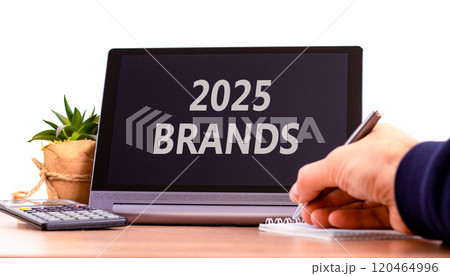 Planning 2025 brands new year symbol. Concept words 2025 Brands on beautiful black tablet. Beautiful white background. Businessman hand. Business 2025 brands new year concept. Copy space. 120464996