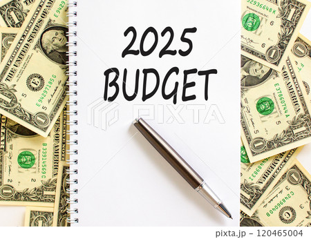 Planning 2025 budget new year symbol. Concept words 2025 Budget on beautiful white note. Beautiful background from dollar bills. Black pen. Business 2025 budget new year concept. Copy space. Planning 2025 budget new year symbol. Concept words 2025 Budget on beautiful white note. Beautiful background from dollar bills. Black pen. Business 2025 budget new year concept. Copy space. 120465004