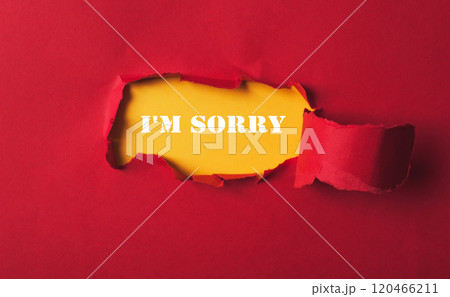 Red background with a hole in it and the words I'm sorry written in white 120466211