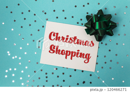 Christmas shopping sign is on a blue background with stars 120466271