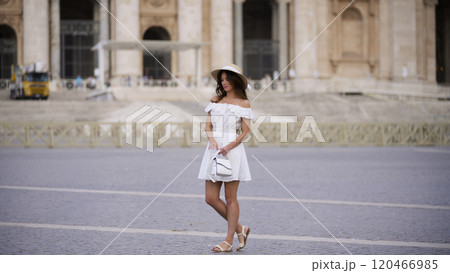 Graceful Woman Exploring St. Peters Basilica in Vatican City  120466985