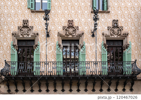 Balcony and three windows. 120467026