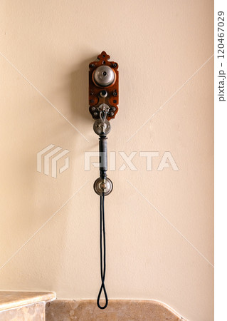 There's a phone on the wall. 120467029