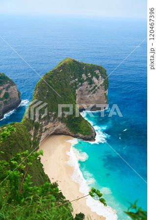 Cinematic aerial landscape shots of the beautiful island dinosaur of Nusa Penida. Huge cliffs by the shoreline and hidden dream beaches with clear water. 120467396