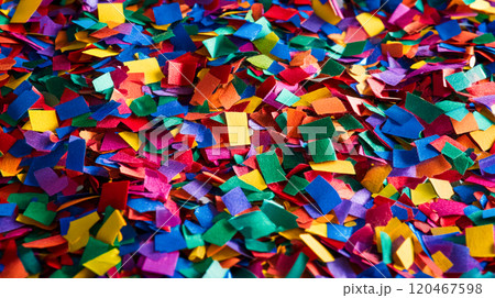 Colourful confetti and Christmas or New Year or Christmas tinsel abstract bright background. Tossing vivid paper confetti. Festive decor for holidays. This is AI-generated item 120467598