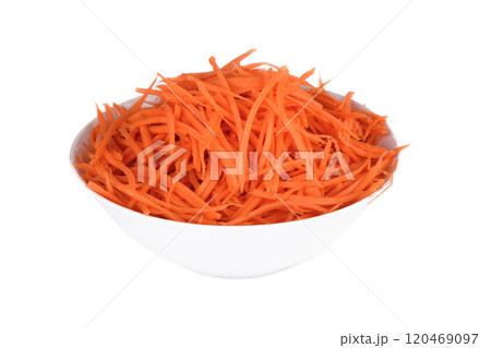 Sliced carrots in a white bowl over white background. Sliced carrots in a white bowl over white background. 120469097