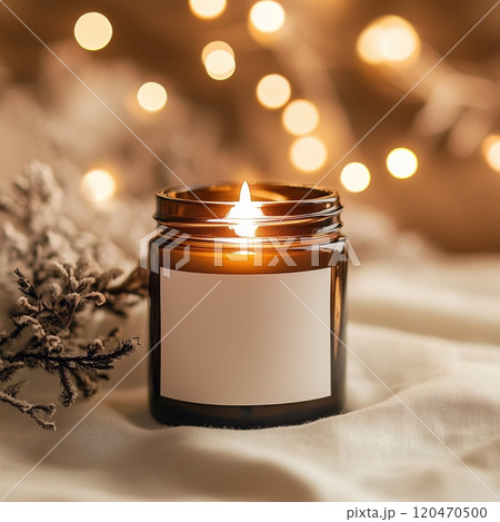 Boho amber glass jar candle mockup, white blank label design preview, beige and brown bohemian home interior with dried flowers and linen 120470500