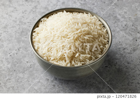 bowl of raw rice bowl of raw rice 120471826