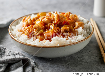 bowl of boiled rice with sweet and sour sauce bowl of boiled rice with sweet and sour sauce 120471830