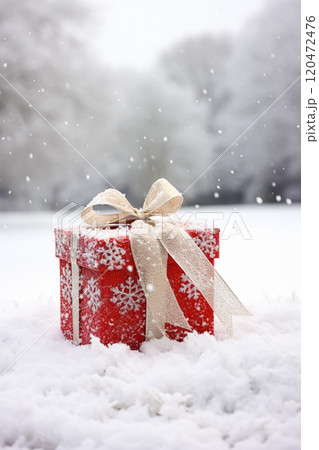 Christmas holiday gift and present, gift box in the snow in snowfall winter countryside nature for boxing day, holidays shopping sale idea 120472476