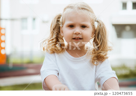 A Playful Child Happily Enjoying Various Outdoor 120473655
