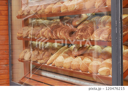 A Beautiful Array of Freshly Baked Breads Displayed Temptingly in a Bakery Window A Beautiful Array of Freshly Baked Breads Displayed Temptingly in a Bakery Window 120476215