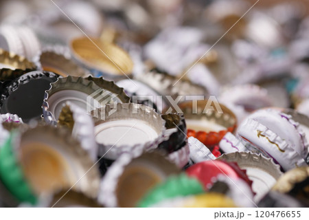 Close-Up of Colorful Bottle Caps in a Random Arrangement Close-Up of Colorful Bottle Caps in a Random Arrangement 120476655