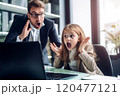 shocked father and daughter in formal wear looking at laptop in office. Selective Focus 120477121